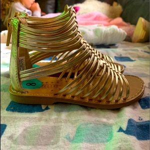 Shiny gold toddler sandals